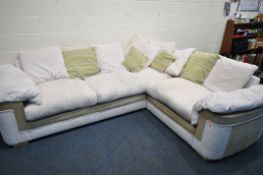 A BEIGE UPHOLSTERED JUMBO CORD CORNER SOFA, with scatter cushions, length 280cm x depth 220cm x