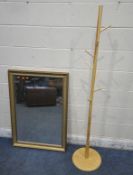 A GILT FRAME RECTANGULAR WALL MIRROR, 104cm x 73cm, along with a modern coat stand, with eight