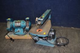 A CLARKE METALWORKER BENCH GRINDER with fine and polishing discs fitted, a bag of loose discs, and a