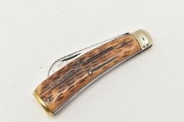 A FLAT CAP PRUNNING KNIFE, fitted with an antler handle, blade signed but worn and unreadable,