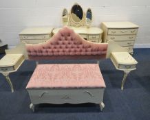 A VARIETY OF FRENCH CREAM BEDROOM FURNITURE, to include a kidney dressing table, with a triple