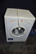 AN INDESIT IDV65 6kg TUMBLE DRYER, width 60cm, depth 55cm, height 85cm and a Panasonic Microwave (