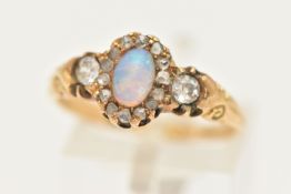 A LATE VICTORIAN 18CT GOLD OPAL AND DIAMOND CLUSTER RING, of an oval form set with a central oval
