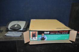 A GEORGE FOREMAN LEAN MEAN FAT REDUCING GRILLING MACHINE, a Tefal ironing station and an Earlex