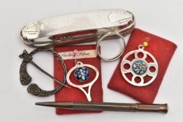 A SMALL BAG OF ASSORTED ITEMS, to include two silver millefiori cabochon set pendants, each