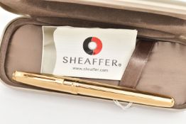 A 'SHEAFFER' FOUNTAIN PEN, a gold plated fountain pen signed 'Sheaffer', together with signed case