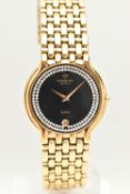 A LADIES GOLD PLATED 'RAYMOND WEIL' WRISTWATCH, quartz movement, round black paste set dial