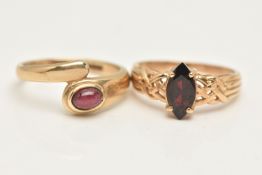 TWO 9CT GOLD GEM SET RINGS, the first set with a marquise cut garnet four claw set to the Celtic