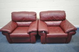 A PAIR OF DARK RED LEATHER ARMCHAIRS, width 116cm x depth 100cm x height 94cm (condition report: