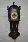 A 20TH CENTURY MAHOGANY DUTCH FRIESIAN REGULATOR WALL CLOCK, the arched hood with a single glazed