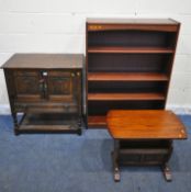 A JAYCEE OAK DOUBLE DOOR CABINET, with a single drawer, raised on turned supports, united by an