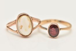TWO GEM SET RINGS, the first a yellow metal carved conch shell cameo ring (cameo very worn),