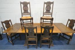 A 20TH CENTURY OAK DRAW LEAF BRETON TABLE, with a scrolled and wavy apron, raised on male and female