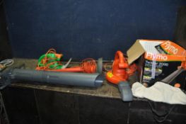 A FLYMO TWISTER 2000 GARDEN BLOWER VAC with original box and some accessories, a Flymo strimmer, a