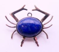 A silver and lapiz crab brooch. 3.25 cm x 2.75 cm.