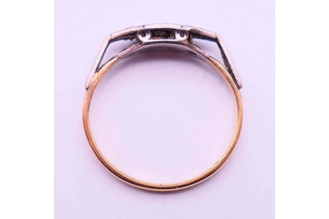 An 18 ct gold and platinum diamond ring. Ring size J. - Image 6 of 6