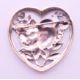A silver brooch in the form of a bird within a heart. 3.25 cm high. - Image 3 of 4