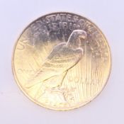 A 1924 silver one dollar 'Peace' coin together with a certificate of authenticity.