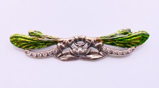 A silver double dragonfly brooch. 7 cm wide.