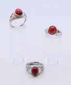 Three silver rings.
