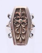 A silver coffin shape/poison ring. Ring size L (adjustable).