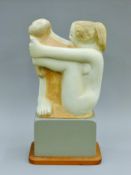 PATECKY, KEN, (born 1936) American, An abstract sculpture on a wooden base plinth. 57 cm high.