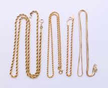 Three 9 ct gold chains and a 9 ct gold bracelet. Longest chain 60 cm long, bracelet 18 cm long. 18.