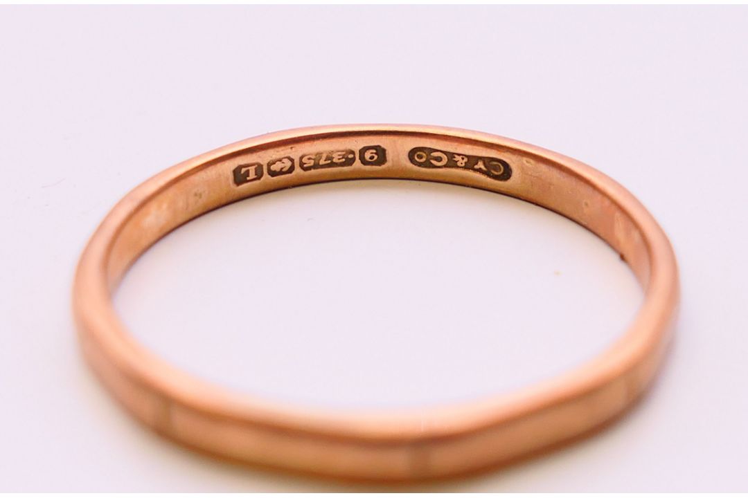 A 9 ct gold band and an unmarked gold cabochon set ring. - Image 3 of 8