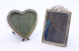 Two silver frames. Heart shaped frame 7.5 cm high, rectangular frame 9 cm x 5.75 cm.