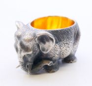 A silver salt formed as an elephant bearing Russian marks. 3 cm high.