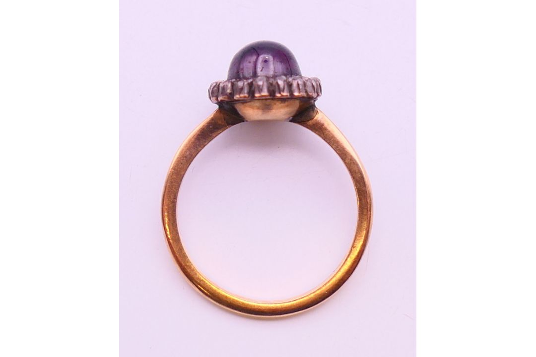 A 9 ct gold band and an unmarked gold cabochon set ring. - Image 8 of 8