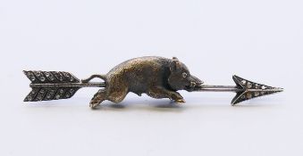 A Russian diamond brooch formed as a boar astride an arrow. 7.5 cm long, 1 cm wide. 15.2 grammes.