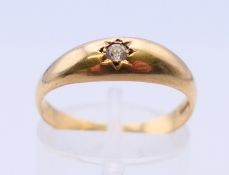 A 9 ct gold diamond ring. Ring size P.