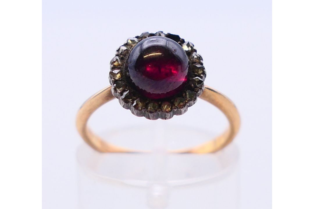 A 9 ct gold band and an unmarked gold cabochon set ring. - Image 6 of 8