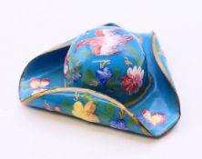 An enamel decorated model of a tricorn hat. 5 cm wide.