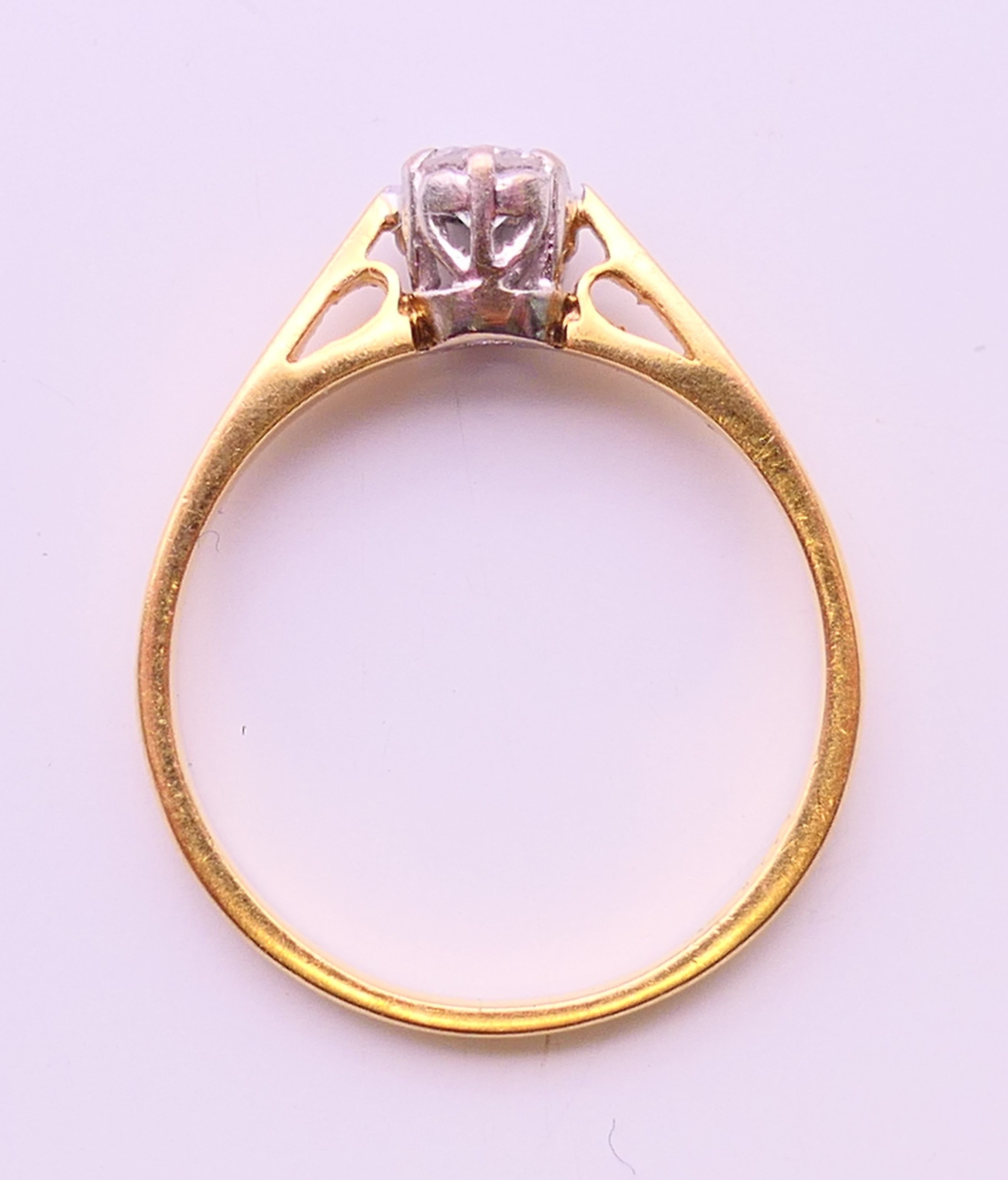 An 18 ct gold diamond solitaire ring. Ring size N. - Image 5 of 5