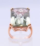 A silver gilt aquamarine ring. Ring size M, aquamarine 1.8 cm x 1.5 cm.