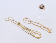 A 9 ct gold dress ring, a 9 ct gold chain and a gold-plated chain.