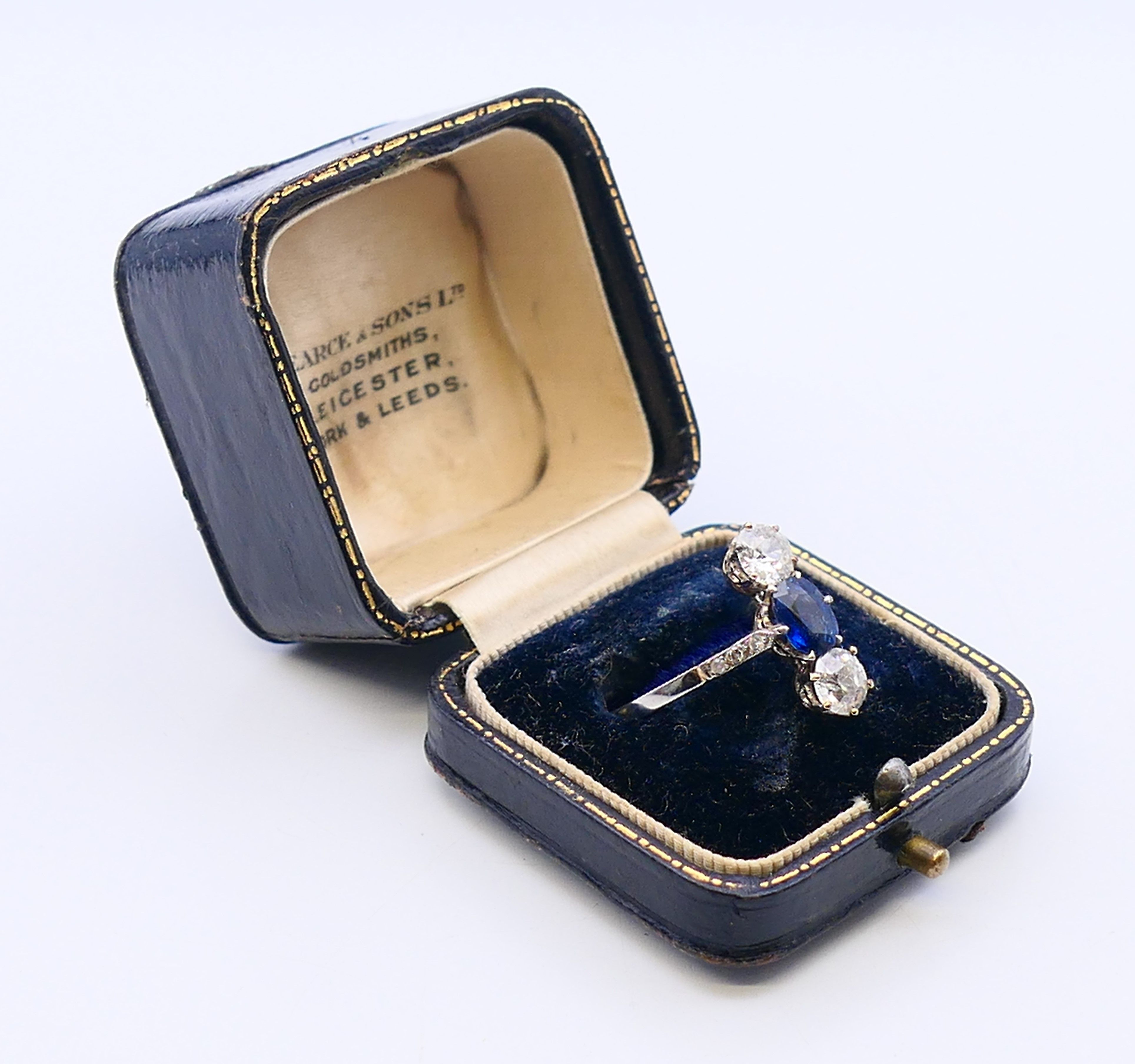 A three stone diamond and sapphire ring. Ring size R. - Image 6 of 6