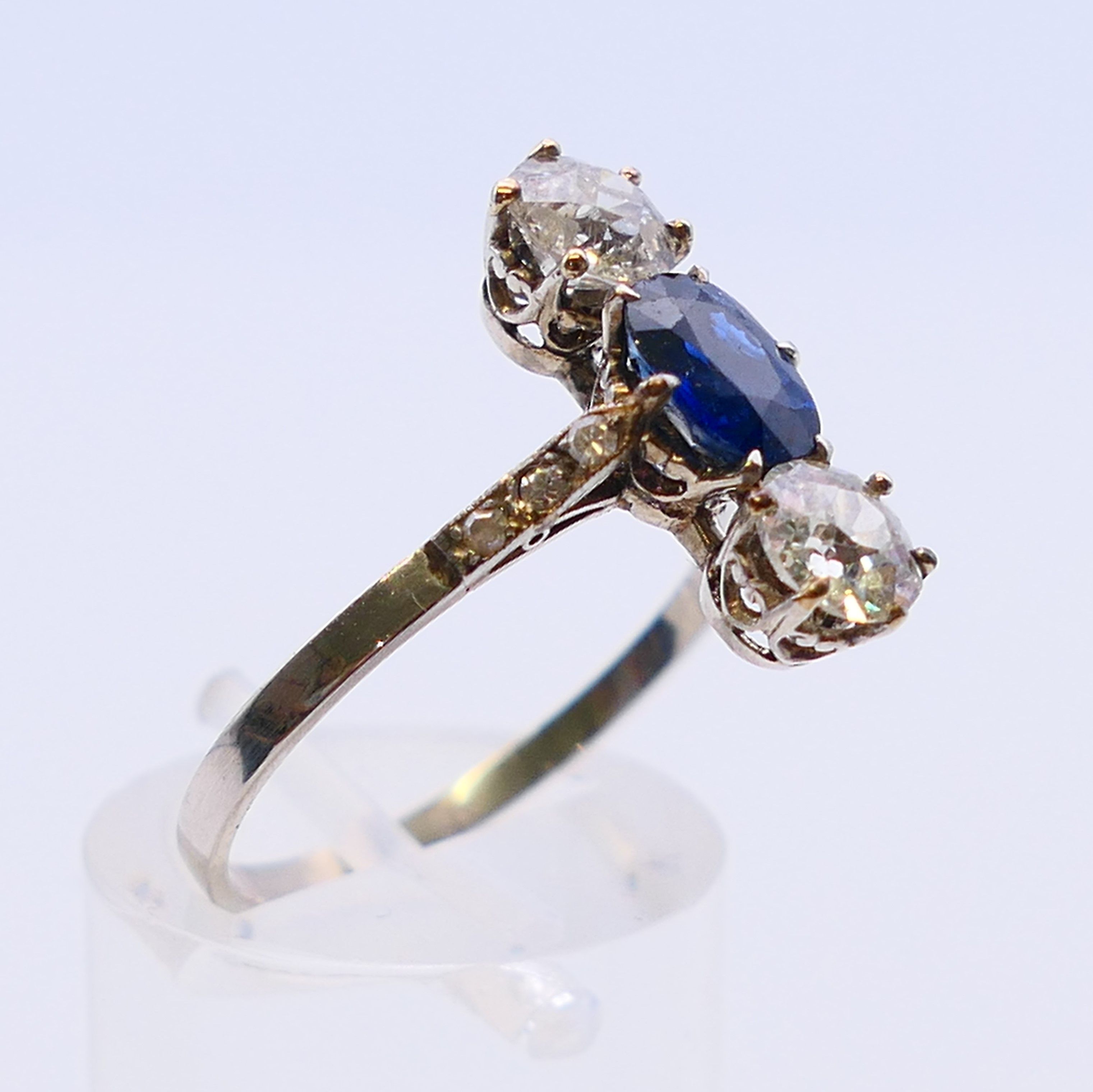 A three stone diamond and sapphire ring. Ring size R. - Image 3 of 6