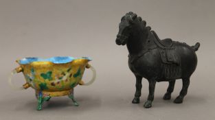 A Chinese bronze horse and an enamelled copper bowl with white jade handles. The former 13.