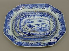 Three 18th century Chinese Export blue and white porcelain plates. The largest 45.5 cm long.