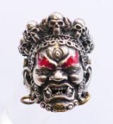 A silver devil ring. Ring size V.