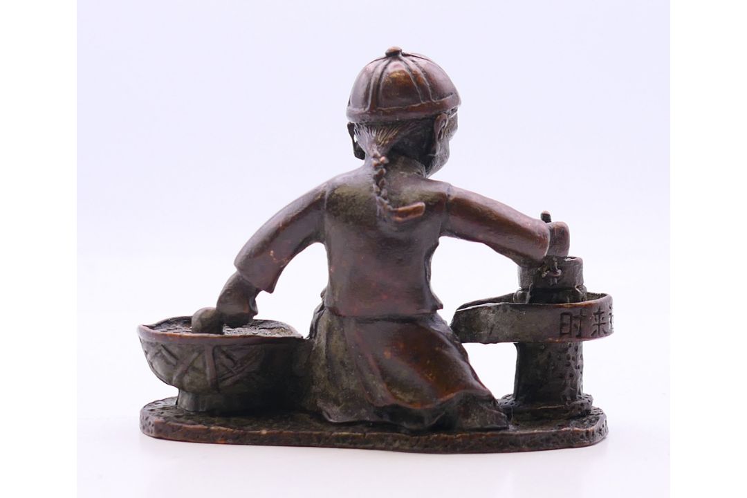 A bronze model of a boy cooking. 7 cm wide. - Image 3 of 4