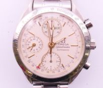 A boxed gentlemen's Omega Speedmaster Automatic wristwatch, number 54874718. 4 cm wide.