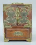 A Chinese brass mounted jewellery cabinet. 23 cm high.
