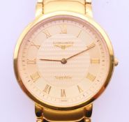 A boxed Longines sapphire wristwatch. 3.5 cm wide.