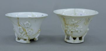 Two 18th century Chinese blanc de chine libation cups. The largest 6.5 cm high.