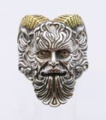 A silver devil ring. Ring size U/V.