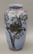 A Japanese blue Satsuma vase, decorated with birds. 38 cm high.